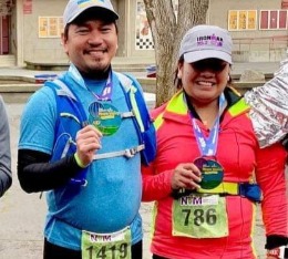 Happy Couple finishes the Napa Marathon and poses with medals