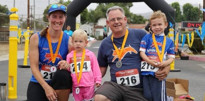 Family finish line photo after YMCA 5k