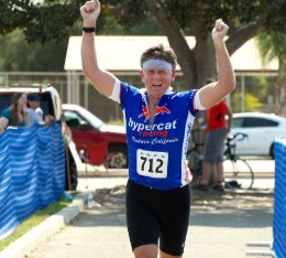 Man runs towards finish line of Camarillo Duathlon