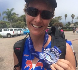 Sarah shows her Santa Barbara Triathlon finishers medal