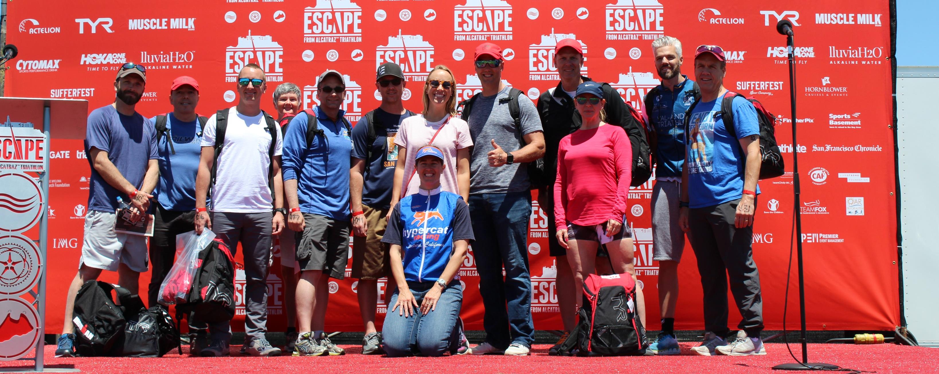 Triathletes on stage at Escape from Alcatraz triathlon in San Francisco