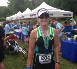 Woman finisher at triathlon