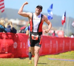 Sean triumphantly finishes the Escape from Alcatraz triathlon